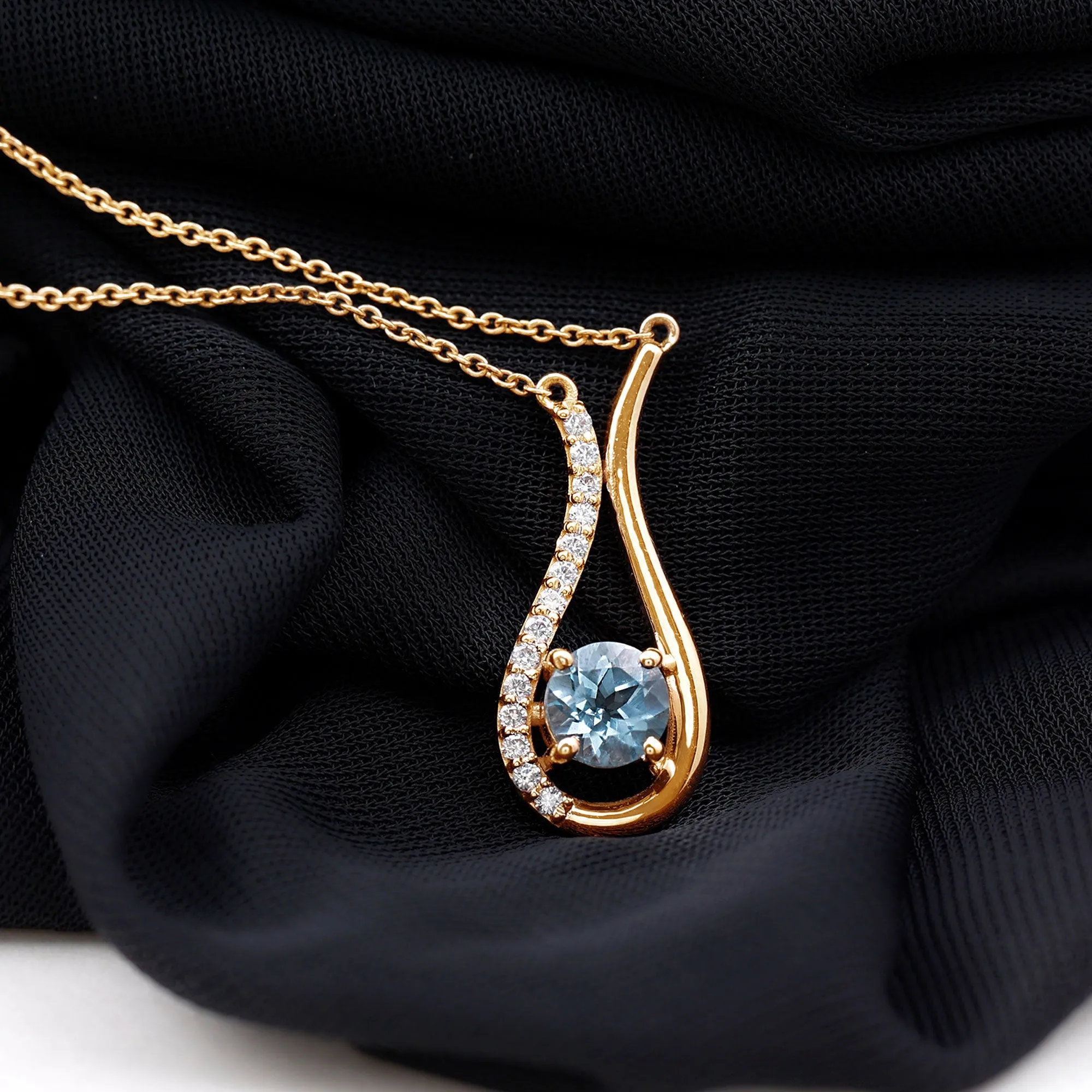 1 CT Sky Blue Topaz and Diamond Teardrop Pendant Necklace