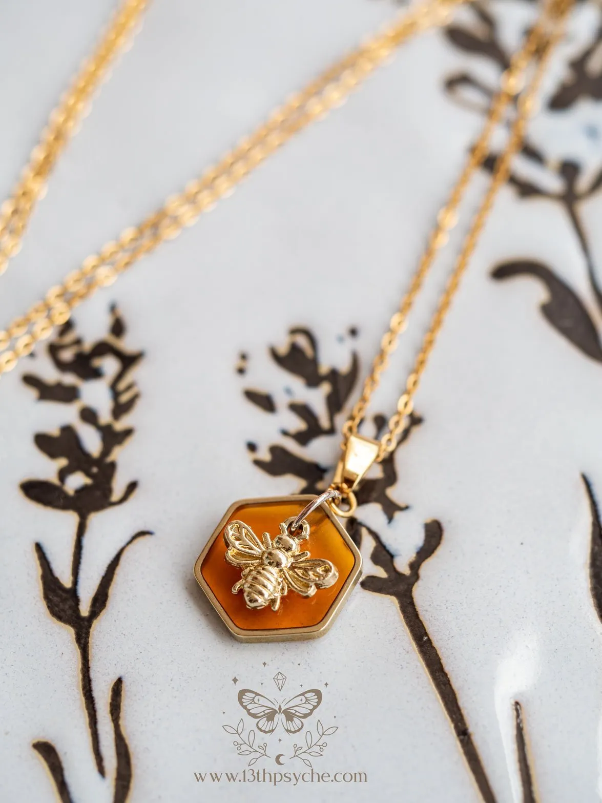 Amber hexagon and bee pendant necklace