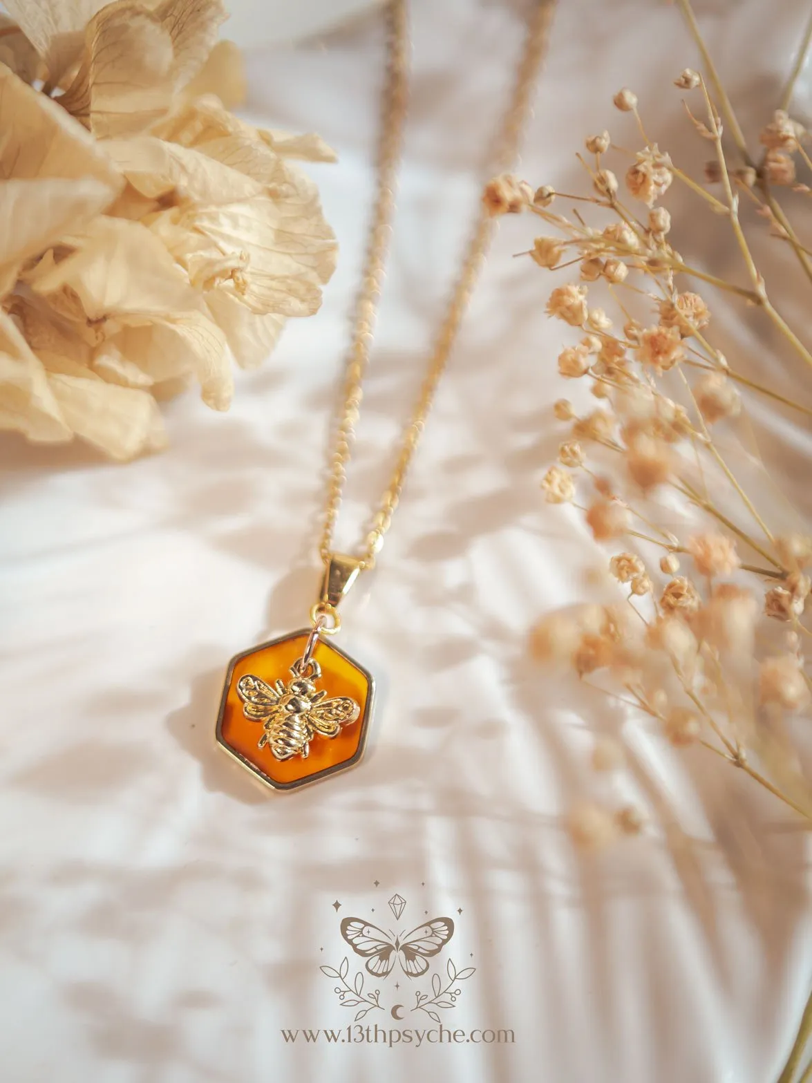 Amber hexagon and bee pendant necklace