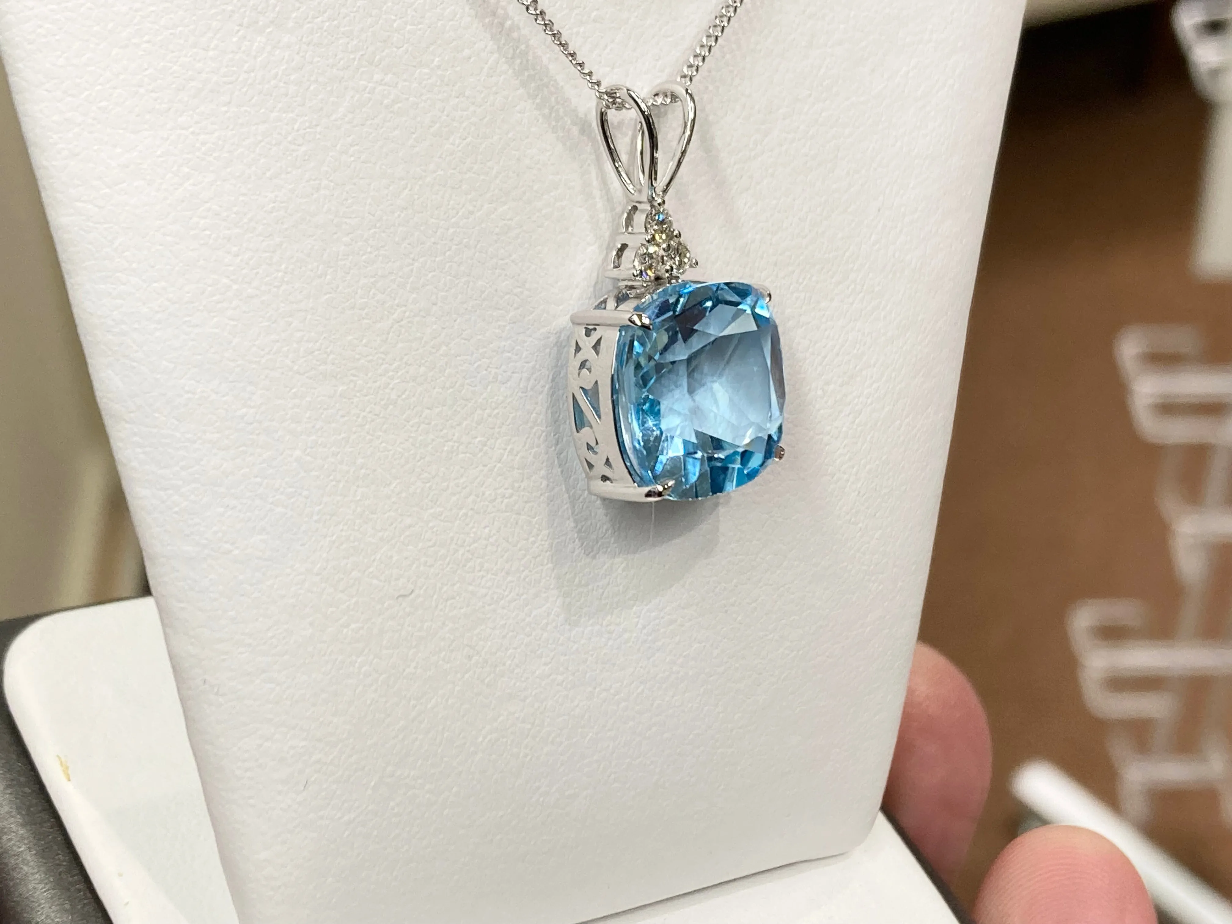 Blue Topaz And Diamond White Gold Pendant